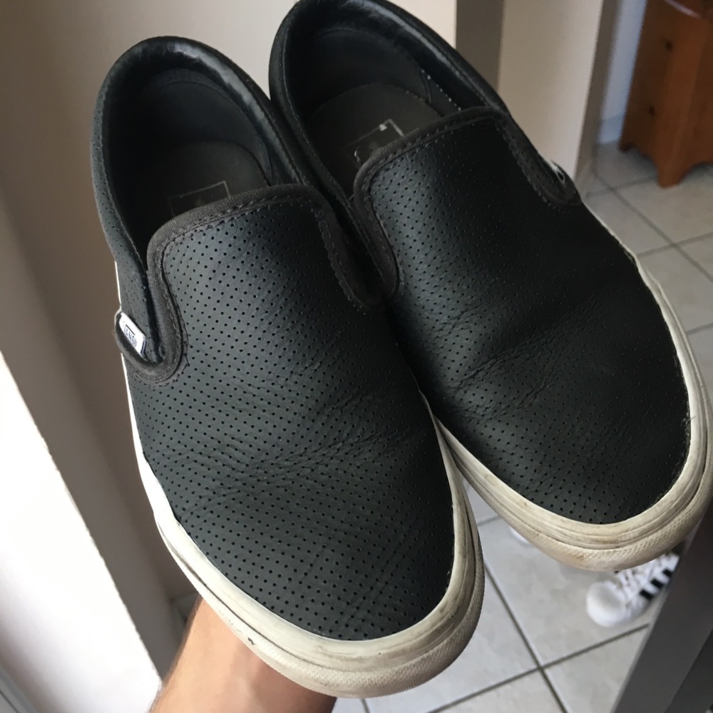 black leather slip on vans